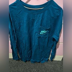 Blue Nike long sleeve with logo on pocket